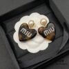6930179112f62673a6facd4d Miu Miu Textured Luxury Pearl Heart Stud Earrings, Minimalist Love Design, Fashionable Retro Style, Must-Have Summer Accessory