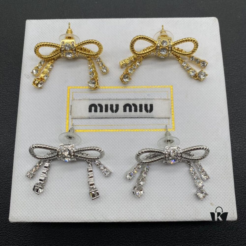 6930179812f62673a6facd58 Miu Miu Textured Luxury Pearl Heart Stud Earrings, Minimalist Design with Retro Charm