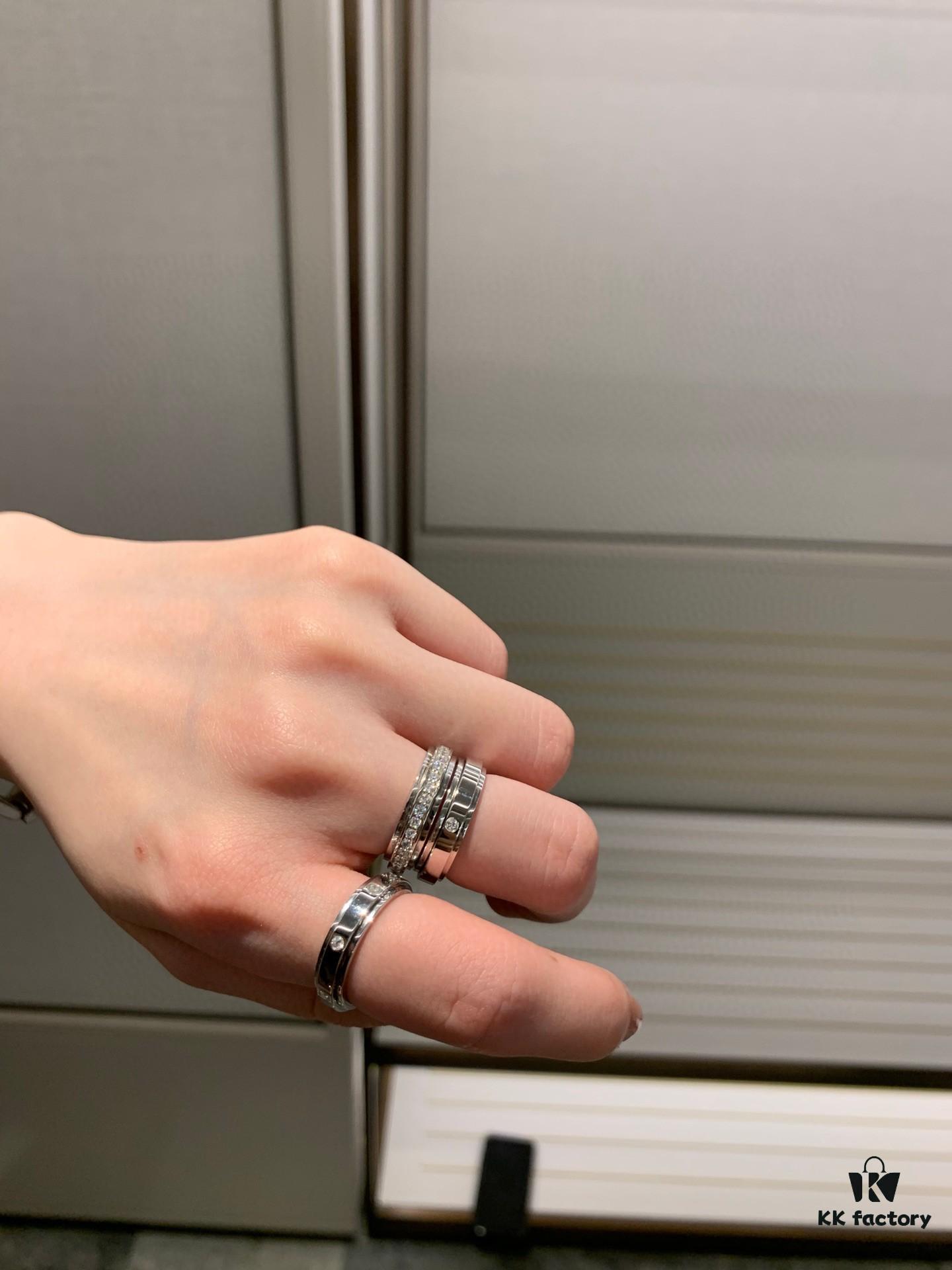 6930181c12f62673a6face39 Platinum-colored Piaget ring with rotating design, featuring single diamond, seven-diamond, and full-diamond options