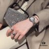 6930181e12f62673a6face3c Platinum-colored Piaget ring with rotating design, featuring single diamond, seven-diamond, and full-diamond options