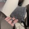 6930182212f62673a6face3f Platinum-colored Piaget ring with rotating design, featuring single diamond, seven-diamond, and full-diamond options
