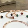 693018d512f62673a6facf59 Piaget Possession Bracelet in Rose Gold with Rotating Circle Set with Two Cabochon Stones and Pavé Diamonds