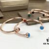 693018d512f62673a6facf5a Piaget Possession Bracelet in Rose Gold with Rotating Circle Set with Two Cabochon Stones and Pavé Diamonds
