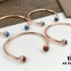 693018d612f62673a6facf5b Piaget Possession Bracelet in Rose Gold with Rotating Circle Set with Two Cabochon Stones and Pavé Diamonds