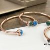 693018d812f62673a6facf5d Piaget Possession Bracelet in Rose Gold with Rotating Circle Set with Two Cabochon Stones and Pavé Diamonds