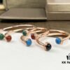 693018d912f62673a6facf60 Piaget Possession Bracelet in Rose Gold with Rotating Circle Set with Two Cabochon Stones and Pavé Diamonds