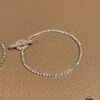 693019bd12f62673a6fad065 YSL Saint Laurent Half-Paved Bracelet & Hermès Pig Nose Fully Paved Diamond Bracelet
