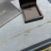 69301a7f12f62673a6fad145 Buccellati Opera Maxi Blue Enamel Bracelet, Retro Court-style Clover and Four-petal Shell Double-sided Necklace with Rigato Silk Finish and Geometric Diamond Inlay
