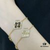69301aa212f62673a6fad16e Buccellati Large Opera Series White Mother-of-Pearl Bracelet, Vintage Court Style Clover and Four-Petal Flower Double-Sided Necklace