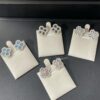 69301c3e12f62673a6fad2db HW Diamond Loop Clover Stud Earrings, ZP Development Version! Crafted in S925 Sterling Silver with Thick Gold Plating