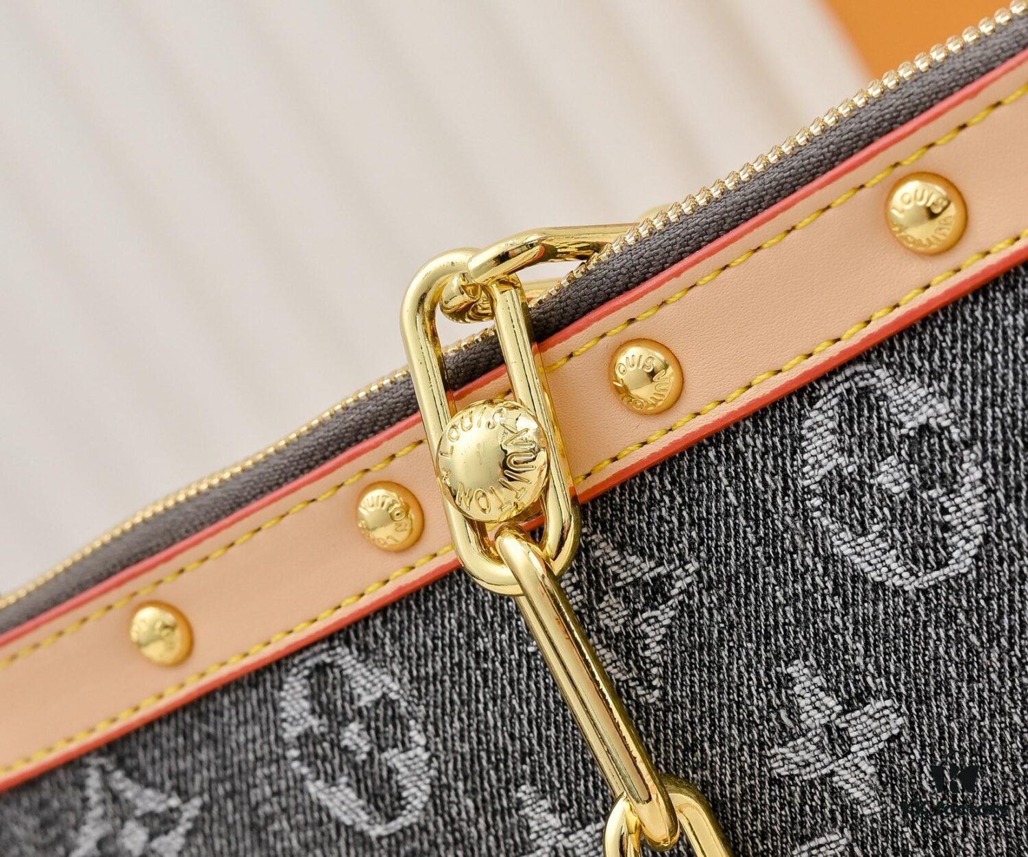 M13404 Denim Coated Canvas Pochette Accessoires Bag with Multicolored Monogram Pattern