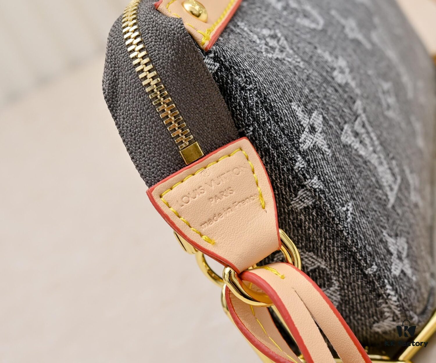 M13404 Denim Coated Canvas Pochette Accessoires Bag with Multicolored Monogram Pattern