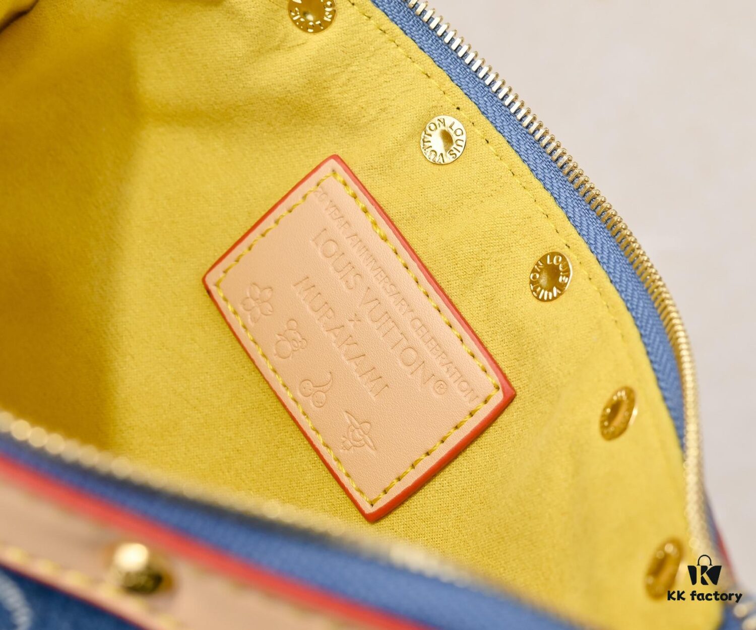 M13404 Denim Coated Canvas Pochette Accessoires Bag with Multicolor Monogram Pattern
