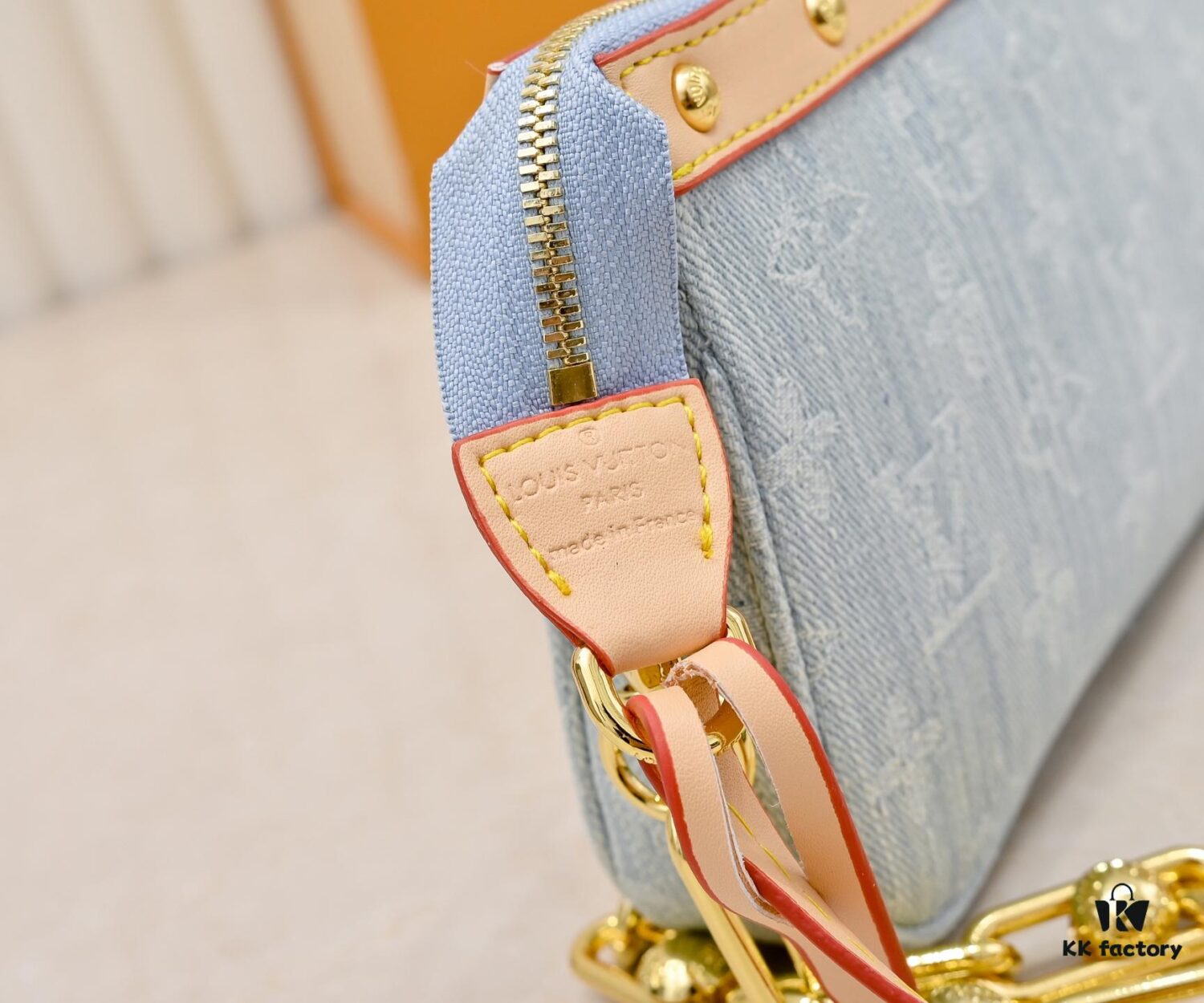 M13404 Denim Coated Canvas Pochette Accessoires Bag with Multicolored Monogram Pattern