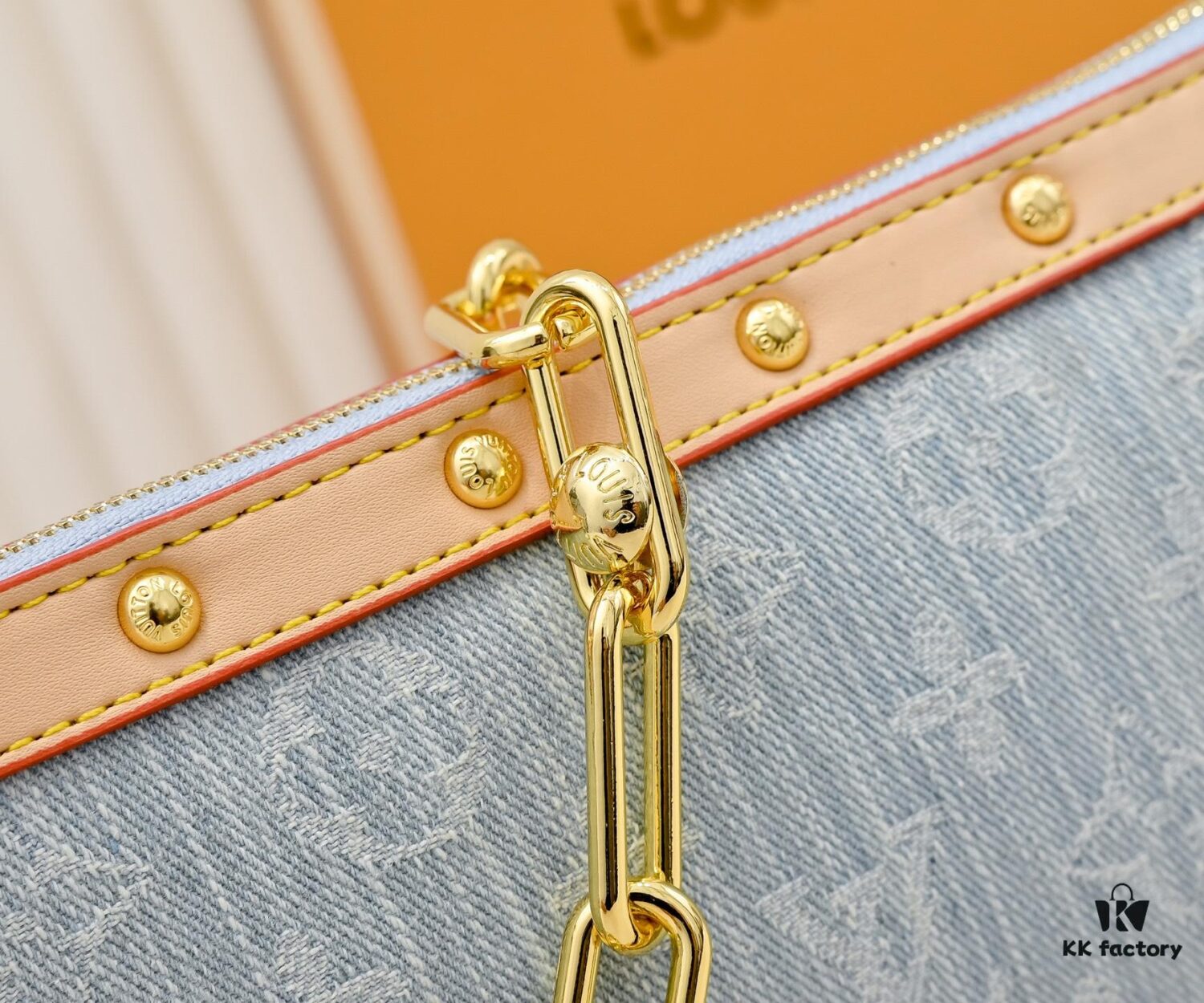 M13404 Denim Coated Canvas Pochette Accessoires Bag with Multicolored Monogram Pattern