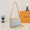 M13404 Denim Coated Canvas Pochette Accessoires Bag with Multicolored Monogram Pattern