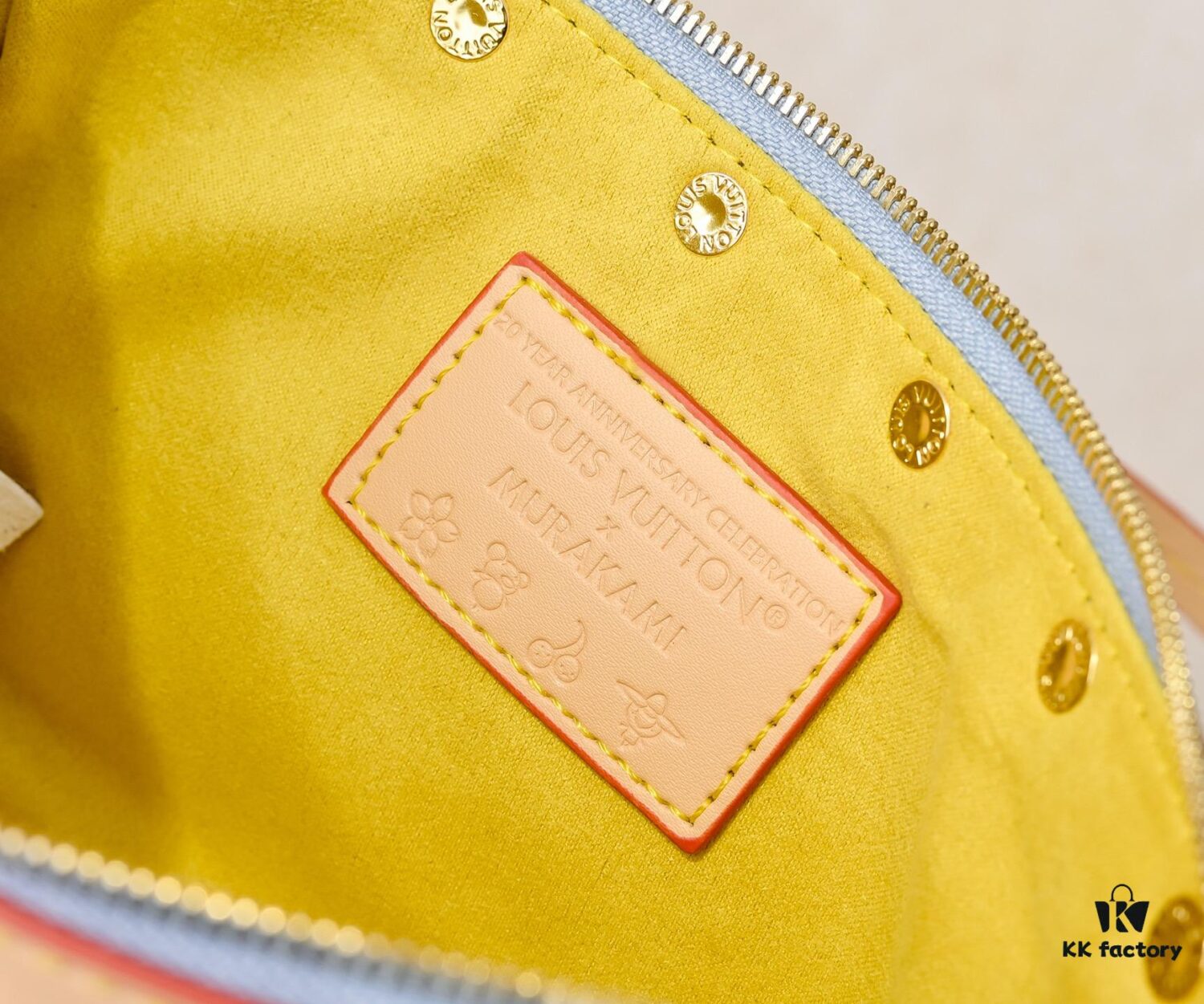 M13404 Denim Coated Canvas Pochette Accessoires Bag with Multicolored Monogram Pattern