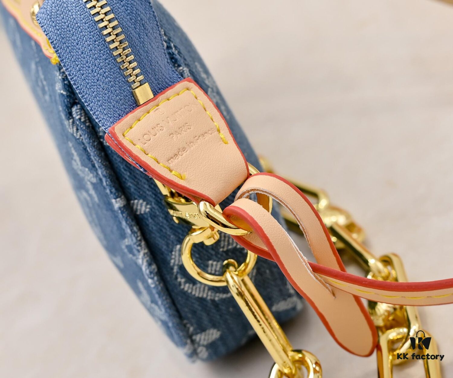 M13404 Denim Coated Canvas Pochette Accessoires Bag with Multicolor Monogram Pattern