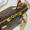 693021a712f62673a6fad8dc Upgraded N41221 Fige M53152 Reading Glasses This Charming Alma BB Bag Inspired by Louis Vuitton's Classic 1934 Design