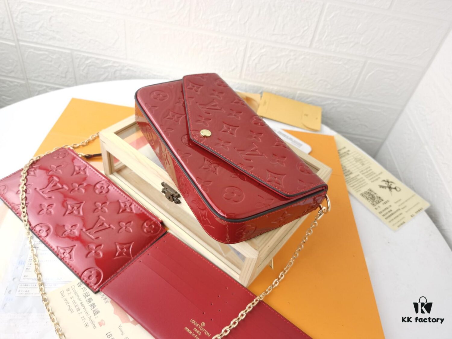 6930238c12f62673a6fada92 Replica High-Quality Full Steel Hardware Embossed Patent Leather Louis Vuitton Felicie Handbag