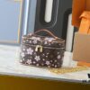 693023e712f62673a6fadae7 Upgraded Original M14181 M44495 Nice Mini Cosmetic Case Made of Monogram Coated Canvas with Rounded Silhouette and Cherry Blossom Pattern from the Louis Vuitton x Takashi Murakami Reimagined Collection, Featuring Cowhide Leather Handle and Double Zipper Closure