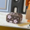 693023fc12f62673a6fadaf7 Upgraded Original M14181 M44495 Nice Mini Cosmetic Case Made of Monogram Coated Canvas with Rounded Silhouette and Cherry Blossom Pattern from the Louis Vuitton x Takashi Murakami Reimagined Collection, Featuring Cowhide Leather Handle and Double Zipper Closure