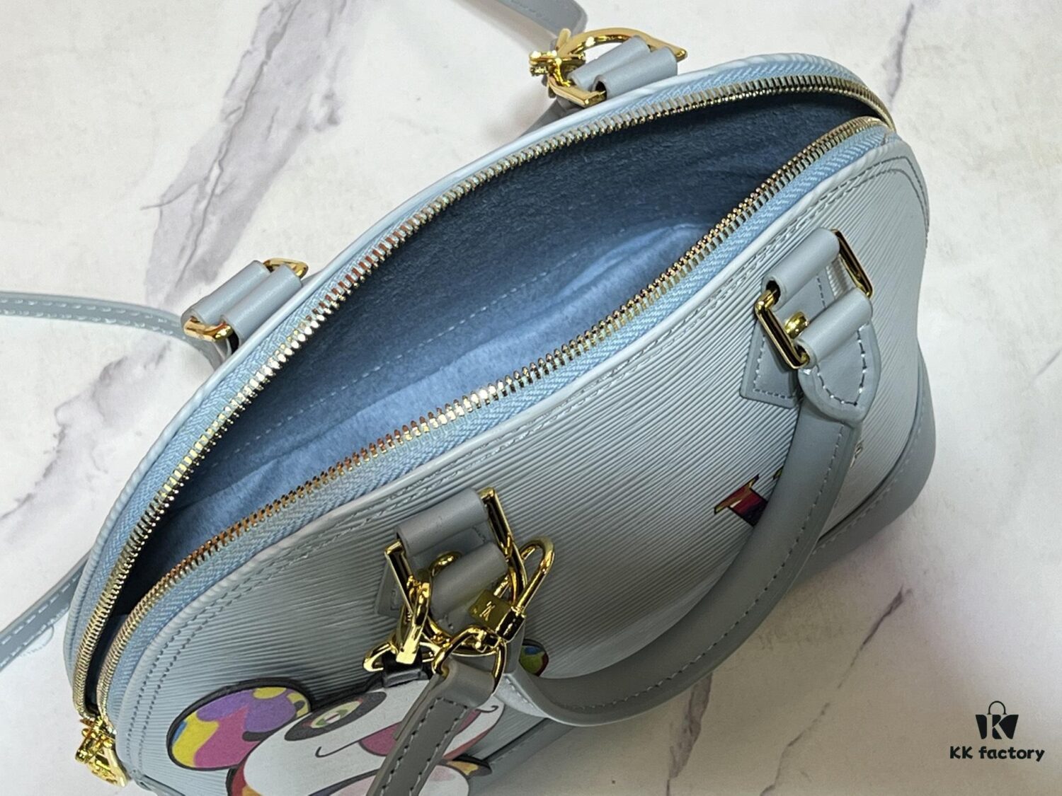 6930246d12f62673a6fadb85 Collaboration Figurine with Murakami M53152 M13670 Louis Vuitton's Most Structured Handbag Design