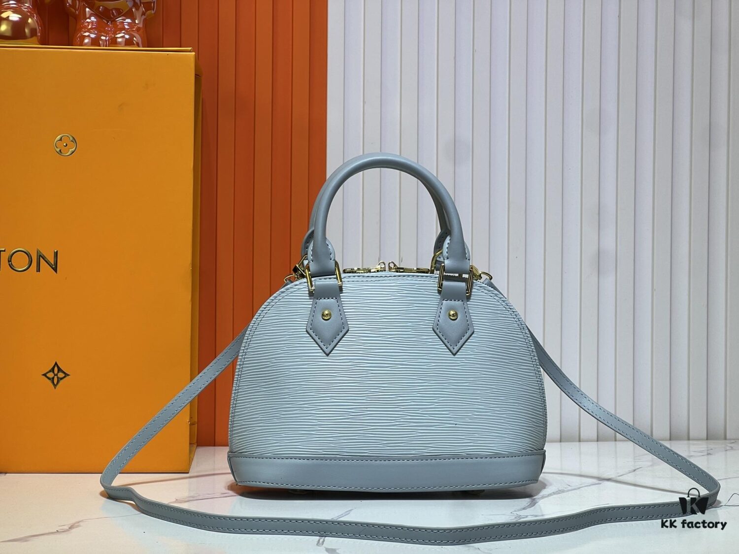 693024e612f62673a6fadbea Collaboration Figurine with Murakami M53152 M13670 Louis Vuitton's Most Structured Handbag Design