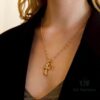 693036a5f09edb6de4c4ccb0 Kuroshin Trendy Essential Item: Double Cross Gold Necklace with Diamond and Polished Surfaces, Reversible and Detachable Design