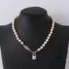 693036c8f09edb6de4c4ccdd Wholesale European and American Fashion Jewelry Saturn Pearl and Enamel 3D Small Lock Necklace for Women, Drop Shipping Available