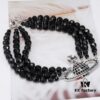 693036cff09edb6de4c4cce8 Vivienne Westwood Black Crystal Triple Saturn Necklace, Slimming Design