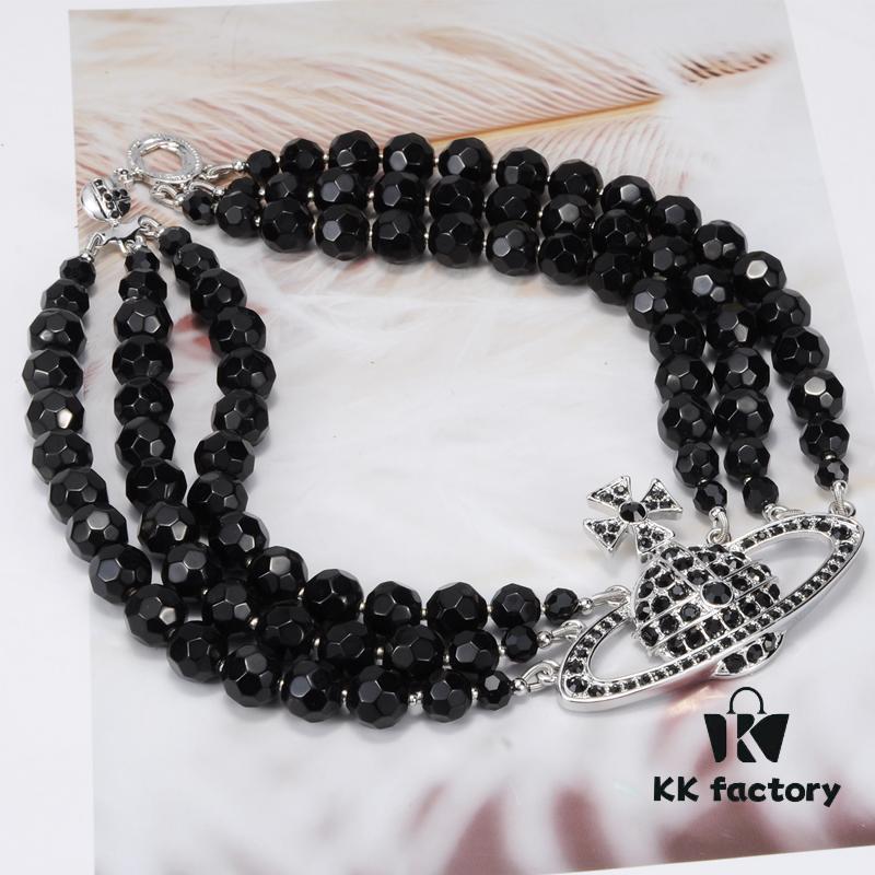 693036cff09edb6de4c4cce8 Vivienne Westwood Black Crystal Triple Saturn Necklace, Slimming Design
