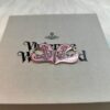 693036d9f09edb6de4c4ccf4 Vivienne Westwood Logo Gear Enamel Earrings - Rose Gold Pink