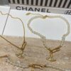 693036e3f09edb6de4c4cd03 Saturn | Vivienne Westwood Jewelry - Brooch Style Pearl Necklace and Bracelet