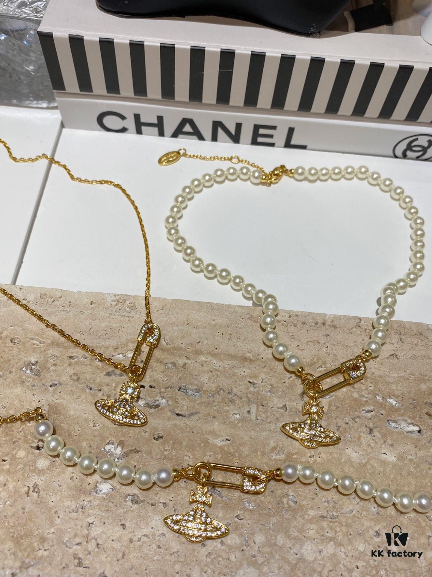 693036e3f09edb6de4c4cd03 Saturn | Vivienne Westwood Jewelry - Brooch Style Pearl Necklace and Bracelet
