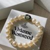 693036e4f09edb6de4c4cd06 Vivienne Westwood Enamel Pearl Bracelet – Magnetic Clasp, Reversible Design, Six New 2023 Colors Available