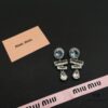 69303713f09edb6de4c4cd2e Miu Miu Textured Luxury Pearl Heart Stud Earrings, Minimalist Design with Vintage Charm, Must-Have Summer Fashion Accessory