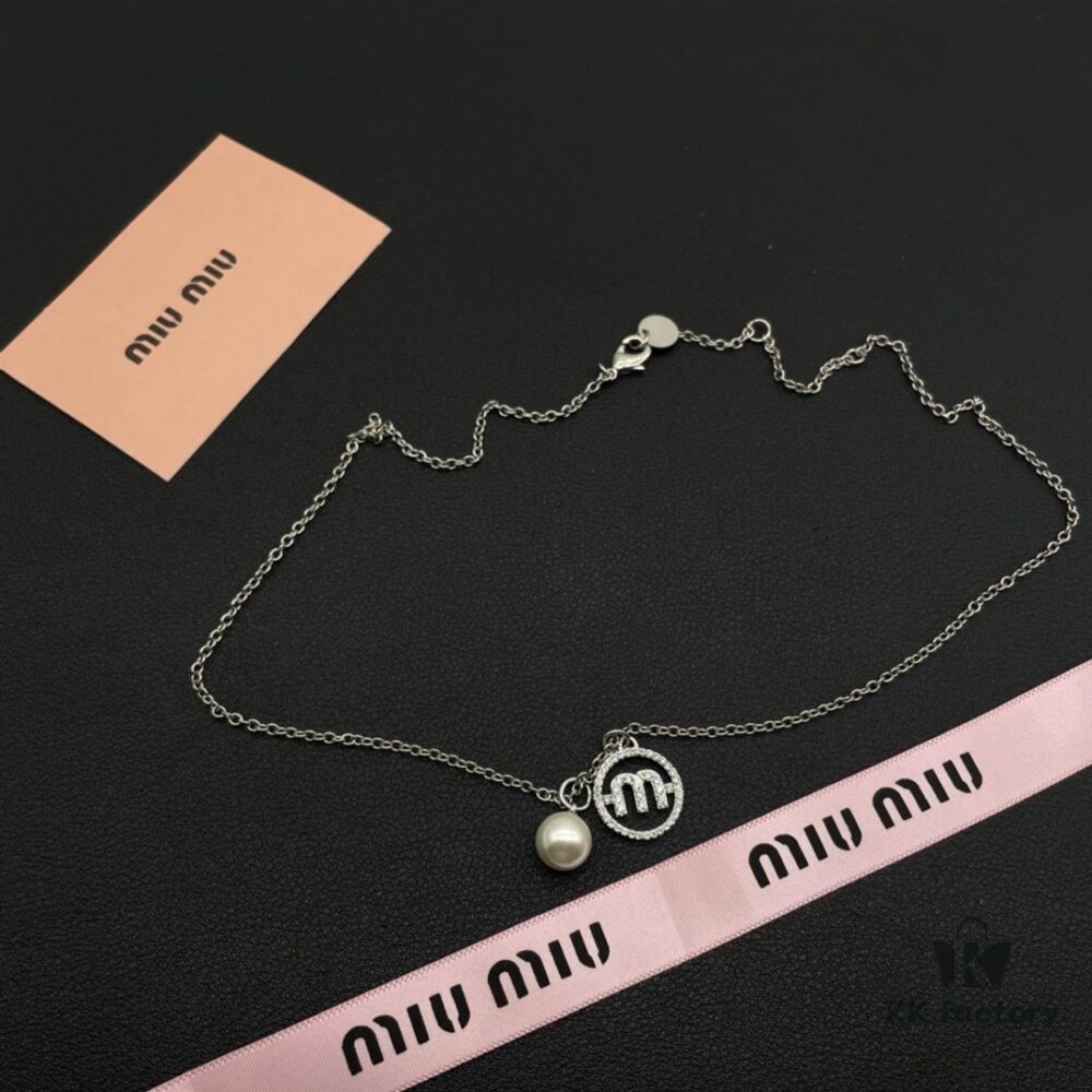 69303713f09edb6de4c4cd2f Miu Miu Textured Luxury Pearl Heart Necklace, Minimalist Design with Retro Elegance