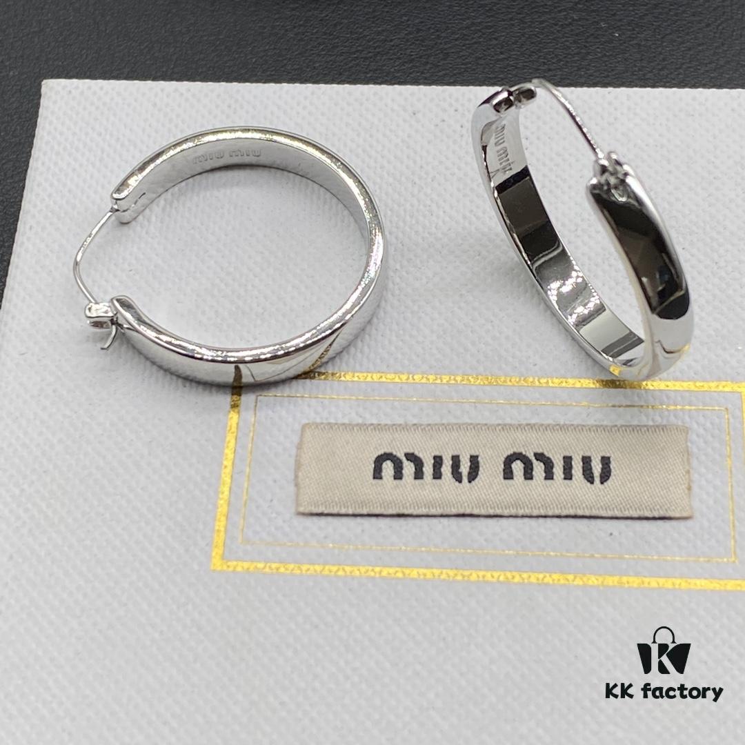 6930371bf09edb6de4c4cd36 Miu Miu Textured Luxurious Pearl Heart Stud Earrings, Minimalist Design with Vintage Charm