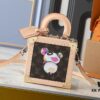 6930377df09edb6de4c4cd98 Top-Quality Replica Dynamic Chip Dual-Color Leather Mini Square Trunk M13127 M14040