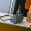 6930383af09edb6de4c4ce57 Upgraded Original M00148 Color Gradient Check M13866 Misty Lake Blue Men's Bag Pillow Bag Speedy HR Series This Keepall 25 Handbag is Crafted from Monogram Eclipse Reverse Canvas Showcasing an Elegant Reinterpretation of Louis Vuitton's Classic Pattern Reinforced Straps and Leather Label Continue the Iconic Elements of the Keepall Collection Zipper Closure Ensures Personal Belongings Travel Securely Dimensions 25.0 x 15.0 x 11.0cm (Length x Height x Width)