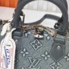 69303872f09edb6de4c4ce8a Upgraded Embossed Denim M53152 This Charming Alma BB Handbag Originates from Louis Vuitton's Classic 1934 Design