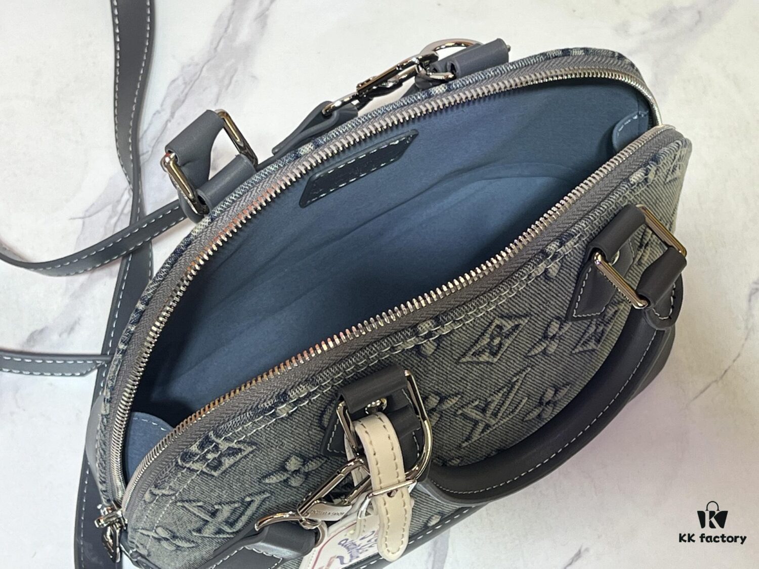 69303875f09edb6de4c4ce8b Upgraded Embossed Denim M53152 This Charming Alma BB Handbag Originates from Louis Vuitton's Classic 1934 Design