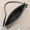 693038ecf09edb6de4c4cef4 M13404 Black and White Coated Canvas Pochette Accessoires Bag