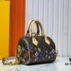 69303913f09edb6de4c4cf27 Speedy Bandoulière 20 Handbag in Monogram Canvas with Cowhide Trim