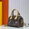 69303917f09edb6de4c4cf2c Speedy Bandoulière 20 Handbag in Monogram Canvas with Cowhide Trim