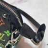 69303967f09edb6de4c4cfad M13404 Black and White Coated Canvas Pochette Accessoires Bag