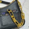 69303a63f09edb6de4c4d0ab M13099 Marellini Handbag crafted from textured Epi leather with a compact silhouette and ample space for daily essentials like a smartphone