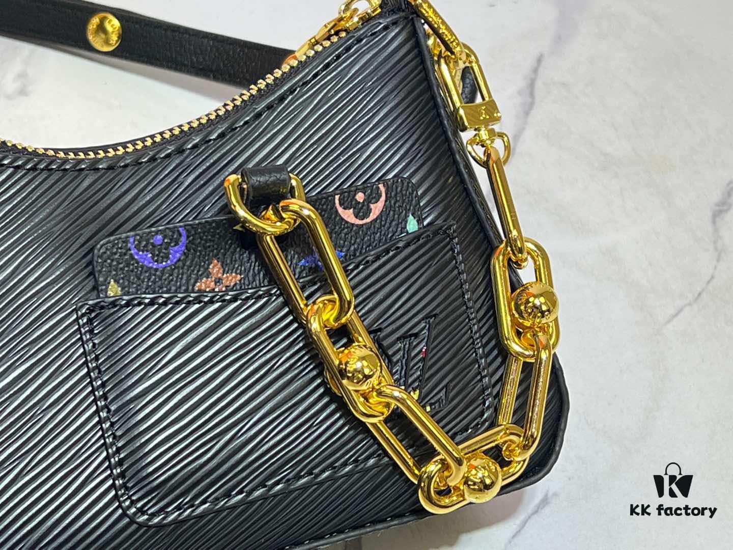 69303a63f09edb6de4c4d0ab M13099 Marellini Handbag crafted from textured Epi leather with a compact silhouette and ample space for daily essentials like a smartphone