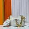 69303a69f09edb6de4c4d0b3 M13099 Marellini Handbag crafted from textured Epi leather with a compact silhouette, offering ample space for daily essentials like a smartphone. Features a round coin purse and mirror made from the vibrant Monogram canvas of the Louis Vuitton × Takashi Murakami collaboration, attached to the bag via a bold metal chain. Dimensions: 19x13.5x6.5cm